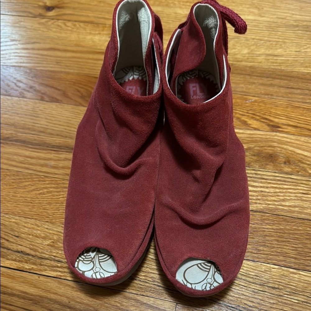 Fly London Red Mules with Unique Design
